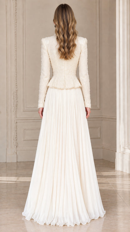 Back view of ivory cream tailored peplum jacket and floor-length pleated skirt