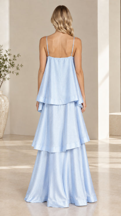 Model wearing light blue tiered cami maxi dress back view