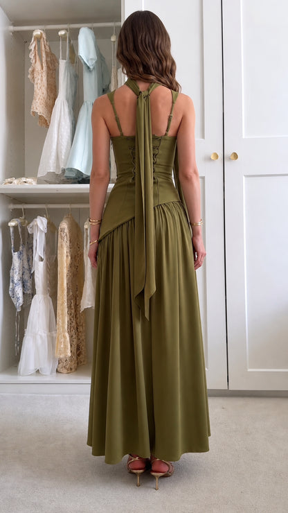 Back view of olive green corset maxi dress showing lace-up back and trailing scarf