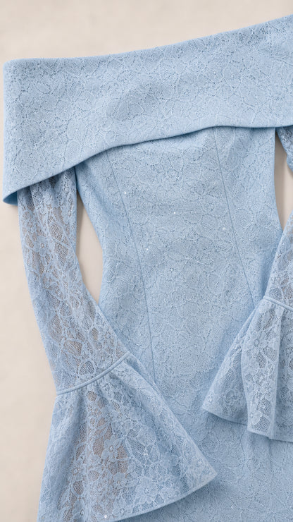 Close-up detail of Light Blue floral lace texture and fold-over neckline