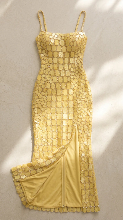 Flat lay of Yellow sequin gown showing soft lining and side slit detail