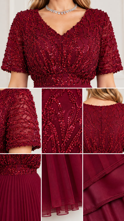 Close up details of sequin beaded embroidery, V-neckline, sleeve, and pleated hem