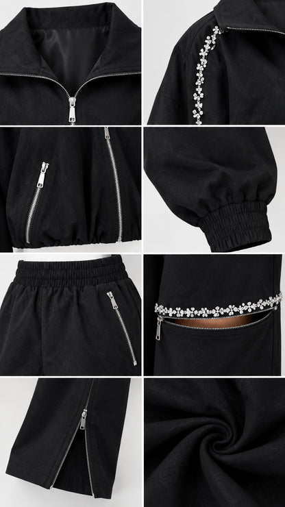 Close-up details of rhinestone trim, metal zippers, elastic cuffs, and cut-out knee design