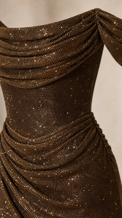 Close-up detail of draped cowl neckline and metallic glitter ruching on Bronze gown