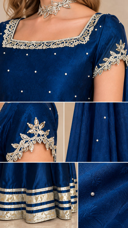 Close-up details of metallic lace neckline, pearl accents, and border trims