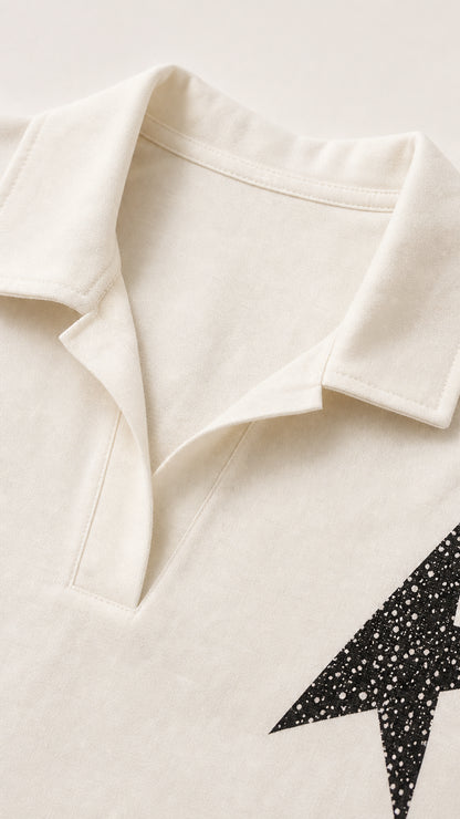 Close-up detail of the open notch collar and star graphic patch