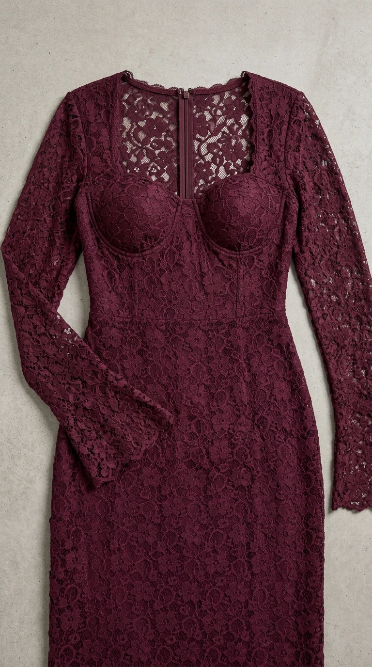 Close-up flat lay detail of burgundy lace bodice and sweetheart neckline