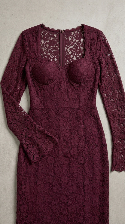 Close-up flat lay detail of burgundy lace bodice and sweetheart neckline