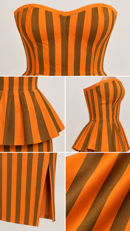 Close-up details of the sweetheart neckline, flared peplum waist, and slit hem
