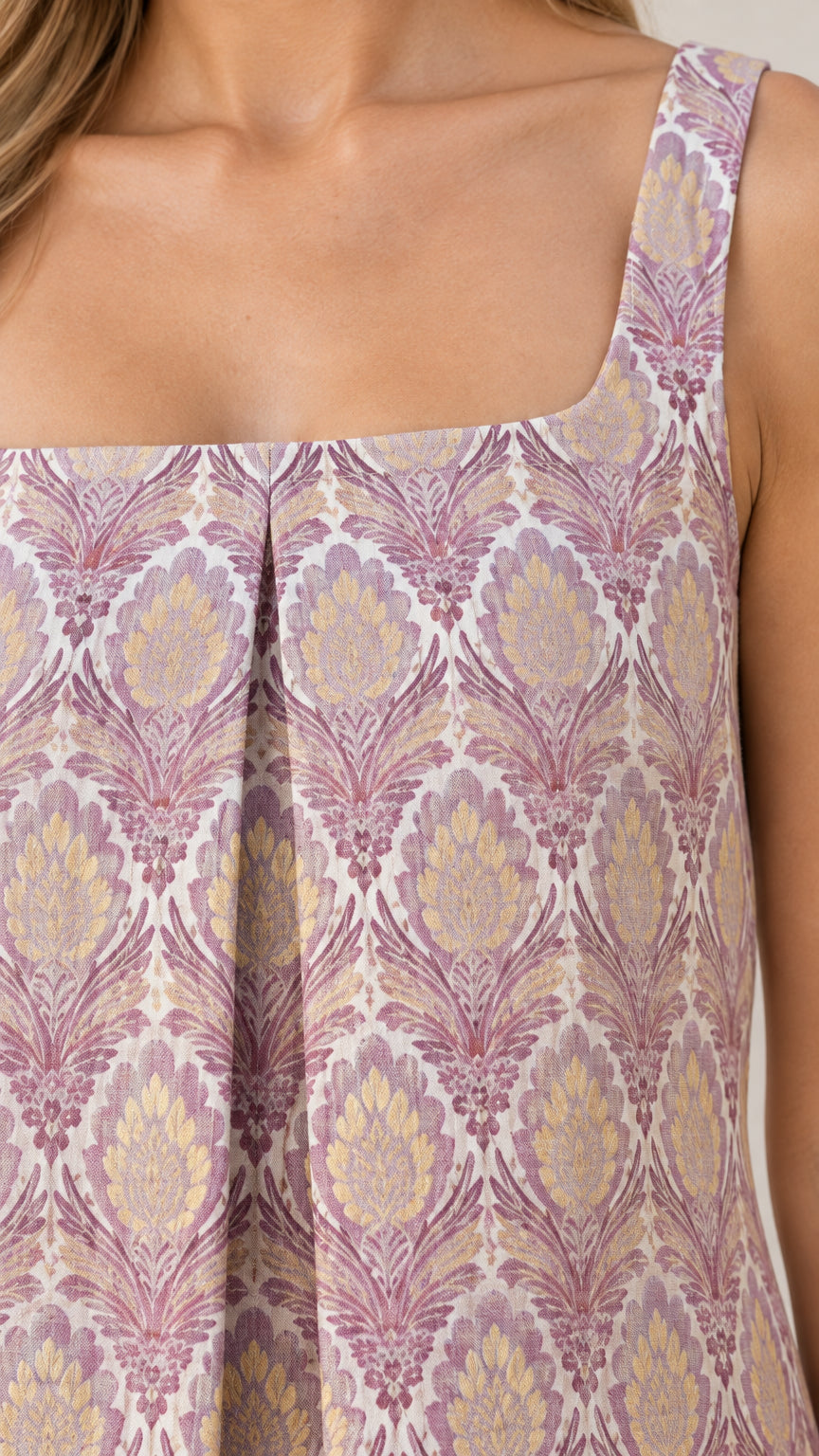 Close-up detail of square neckline and front inverted pleat on dusty lilac damask dress