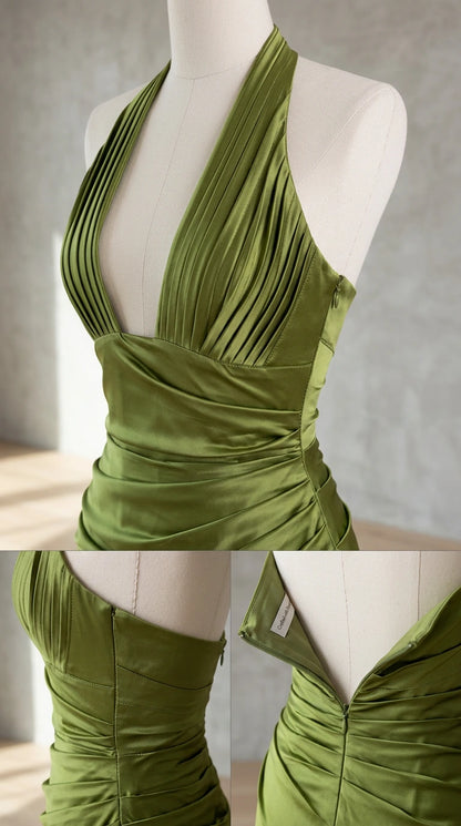 Close-up details of pleated plunge halter neckline and hidden zipper
