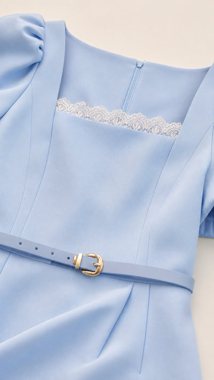 Close-up detail of lace trim neckline and matching belt on Light Blue dress
