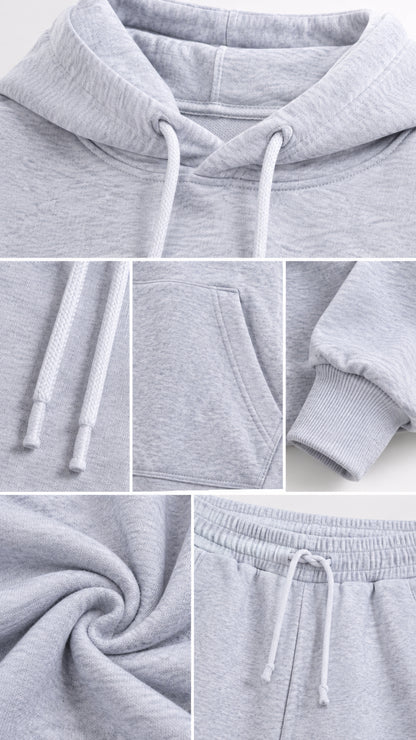 Detailed close-up of light grey hoodie neckline, drawstrings, kangaroo pocket, ribbed cuff, and elastic waistband