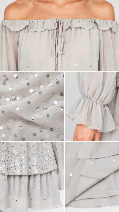 Close-up details of sequin embroidery, ruffle neckline, and cuff details on Light Grey dress