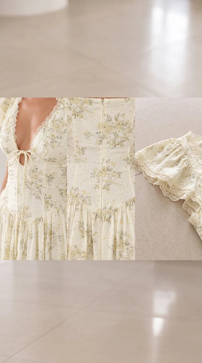 Close-up details of neckline tie, bodice fabric, and delicate lace trim sleeves