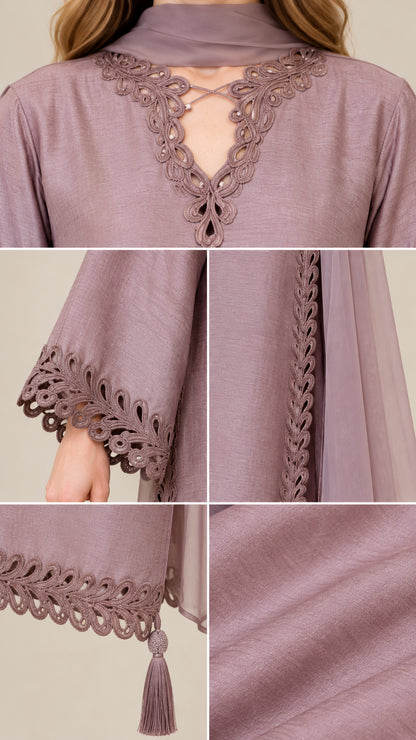 Close-up details of neckline embroidery, cuff lace trim, tassel hem, and textured fabric