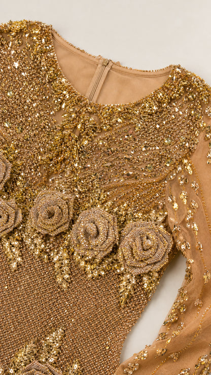 Close-up detail of 3D floral rosettes and sequin beadwork on neckline