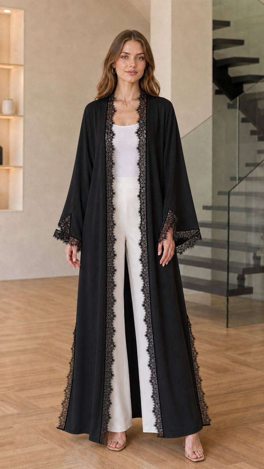 Front view of black open-front maxi kimono cardigan with black lace trim