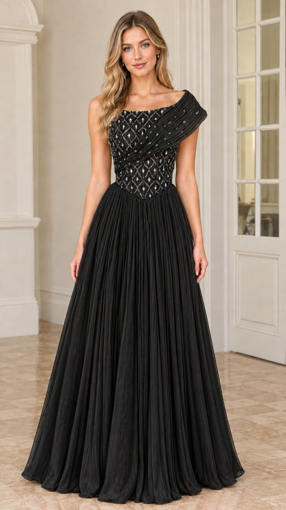 Front view of model wearing Black one-shoulder beaded pleated evening gown