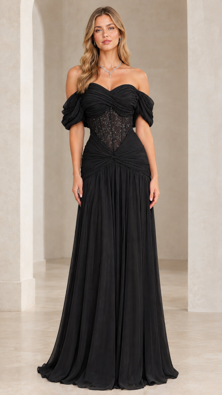 Full front view of woman wearing the Black corset ruched chiffon evening gown