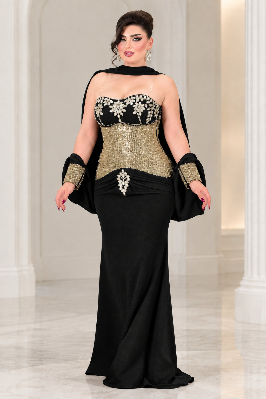 Black strapless sequin corset formal gown with matching draped capelet