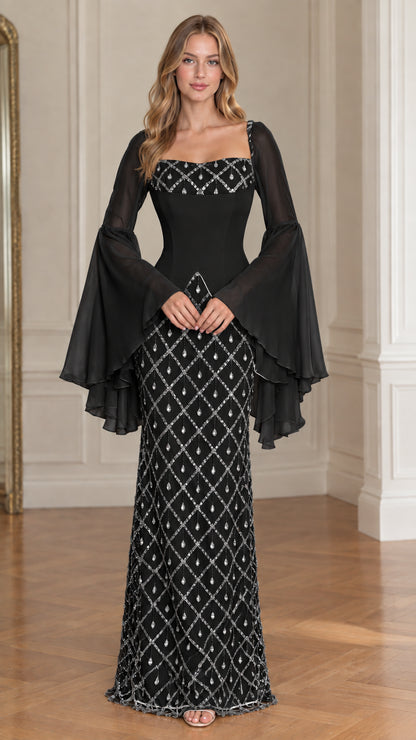 Front view of model wearing Black square neck beaded evening gown with bell sleeves