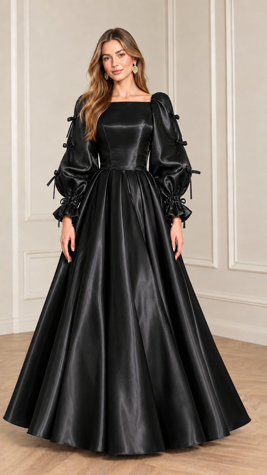 Full-length front view of model wearing Black satin puff sleeve ball gown