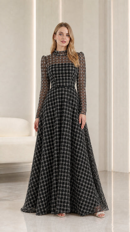 Full-length front view of black embellished illusion high-neck maxi evening gown