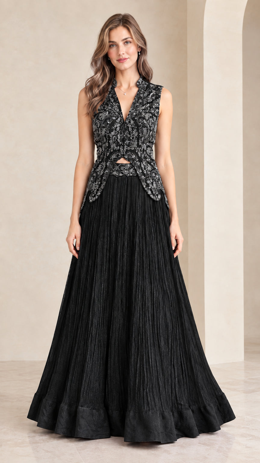 Front view of woman wearing black embroidered sleeveless maxi gown set