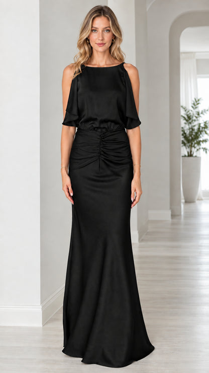 Front view of model wearing black backless ruched satin maxi dress