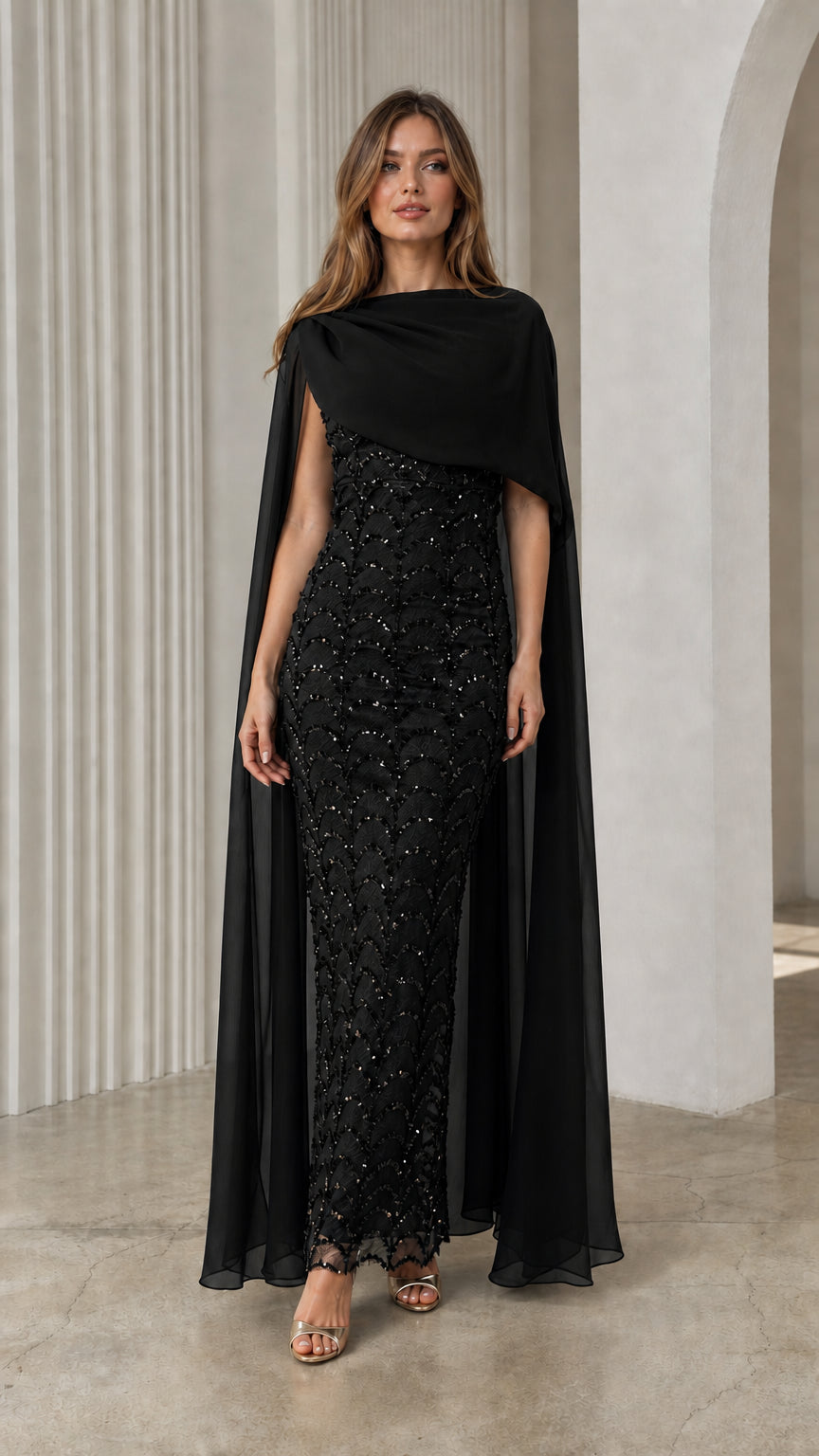 Black sequin column evening dress with matching asymmetrical draped chiffon cape