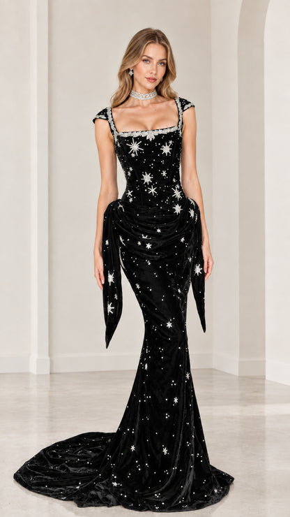 Black velvet star-embellished mermaid formal gown