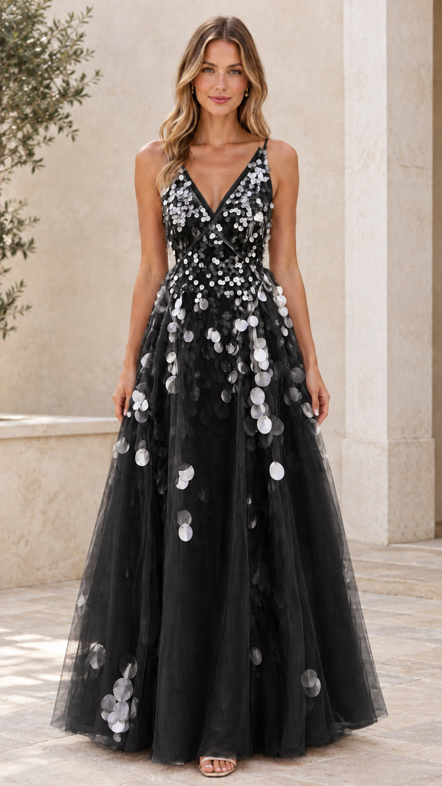 Black tulle A-line evening dress with silver petal appliqués