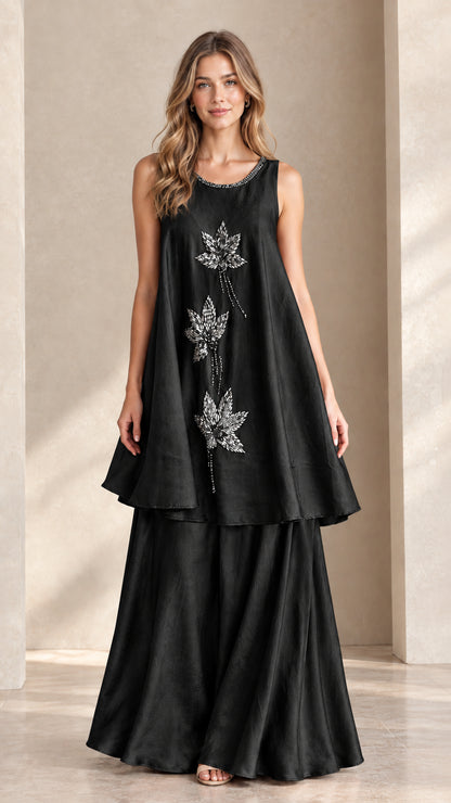 Front view of black sleeveless beaded tunic and palazzo pant set