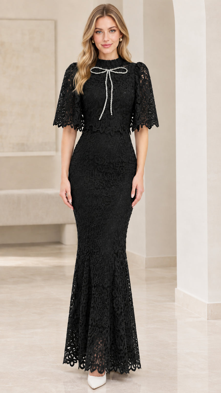 Front view of black lace capelet mermaid maxi evening dress