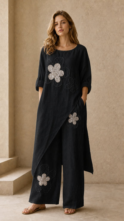 Black two piece asymmetric long tunic and wide leg pants set with silver floral accents