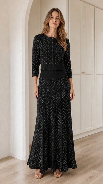 Model wearing Black pointelle knit cardigan and maxi skirt two-piece set