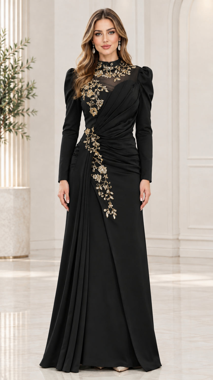 Black long sleeve formal gown with gold floral embroidery and side drape pleating
