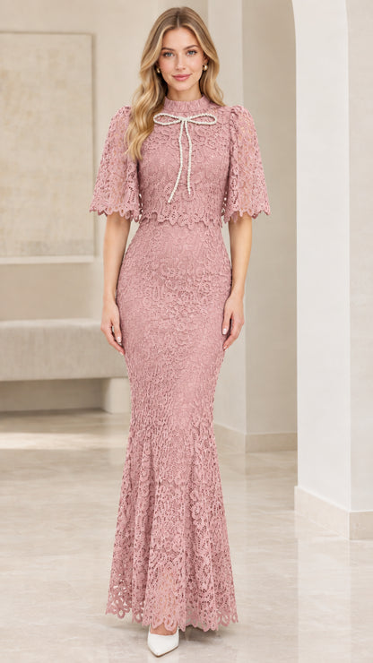 Front view of dusty pink lace capelet mermaid formal dress