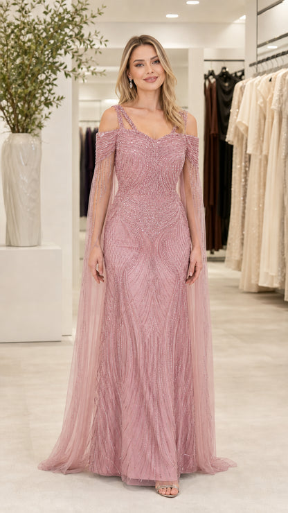 Front view of dusty rose pink beaded formal maxi gown with cape sleeves