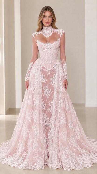 Model wearing the Blush Pink floral lace corset evening dress with long sleeves