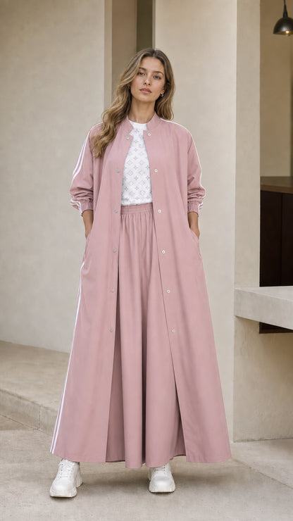 Woman wearing dusty pink sporty maxi duster jacket and wide leg pants set