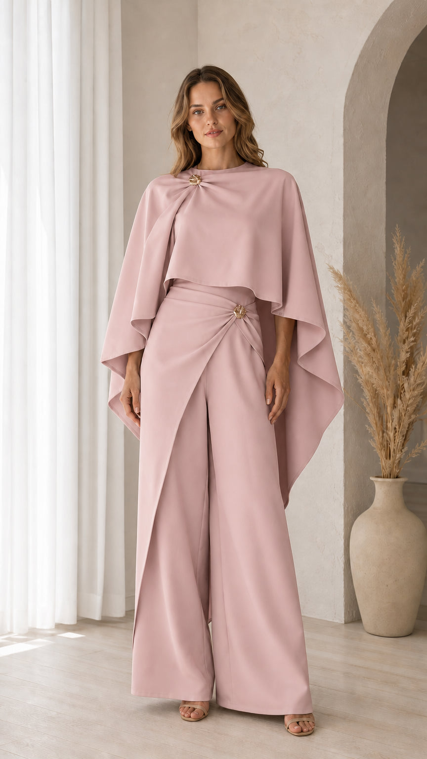 Front view of model wearing Dusty Pink cape top and draped wide-leg pants set