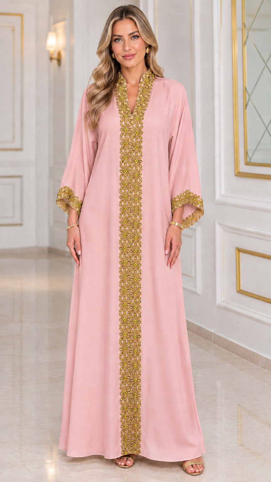 Front view of blush pink kaftan maxi dress with gold embellished trim