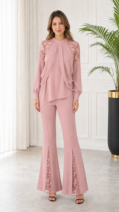 Front full-length view of dusty pink long sleeve lace patchwork top and flare trousers set