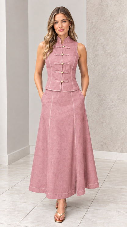 Front full-length view of woman wearing dusty pink mandarin collar vest and maxi skirt set