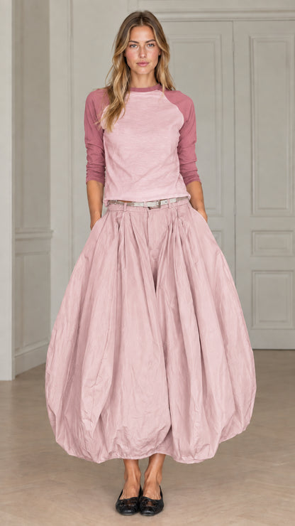 Full front view of women's two-piece raglan top and balloon maxi skirt set in dusty pink