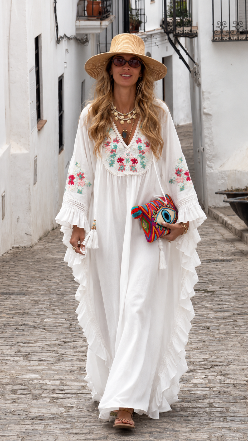 White embroidered caftan maxi dress with ruffle trim and deep V neckline