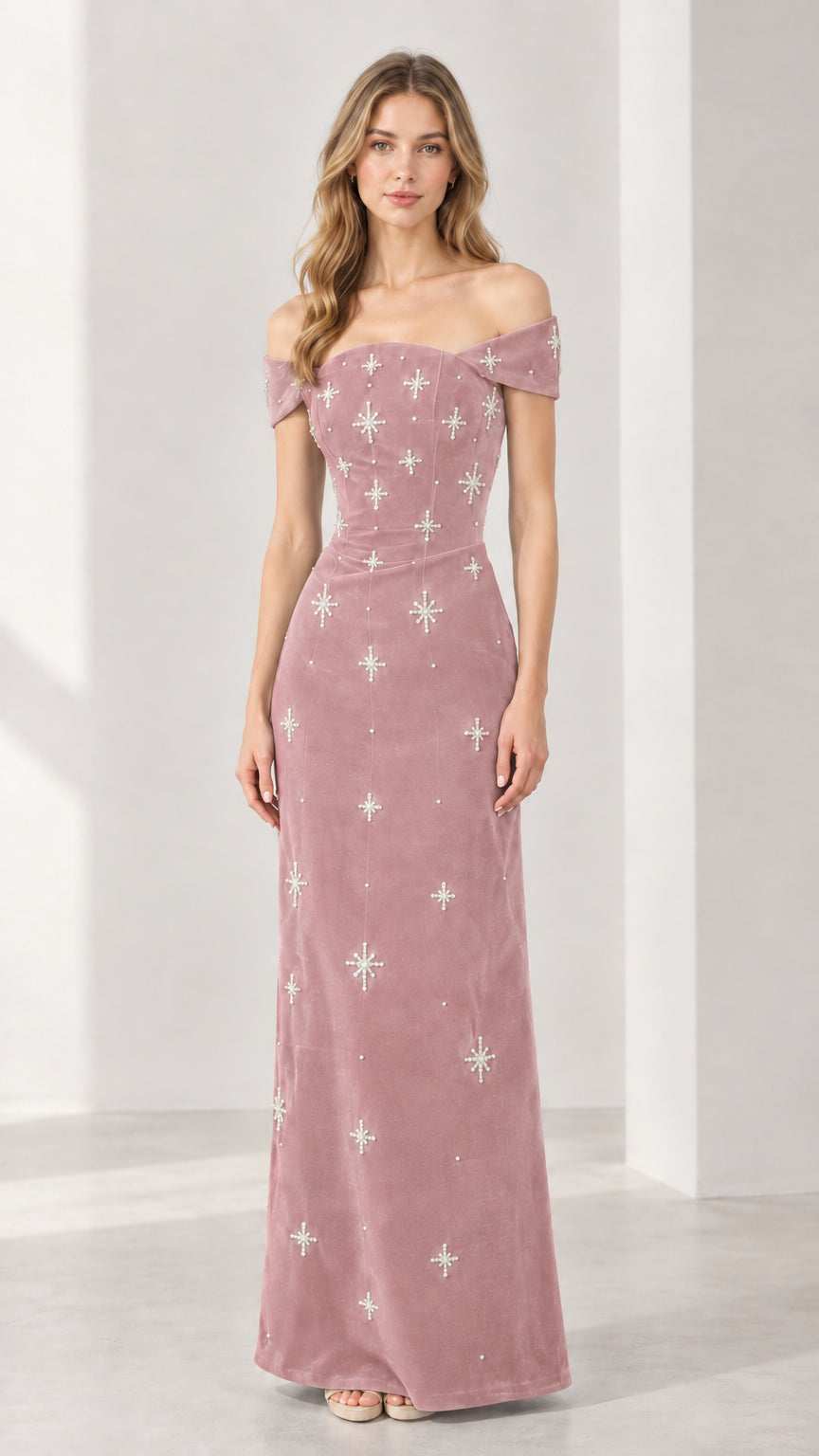 Dusty rose pink off-the-shoulder velvet maxi dress with starburst embellishments