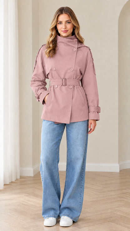 Model wearing dusty pink double-breasted belted short trench coat